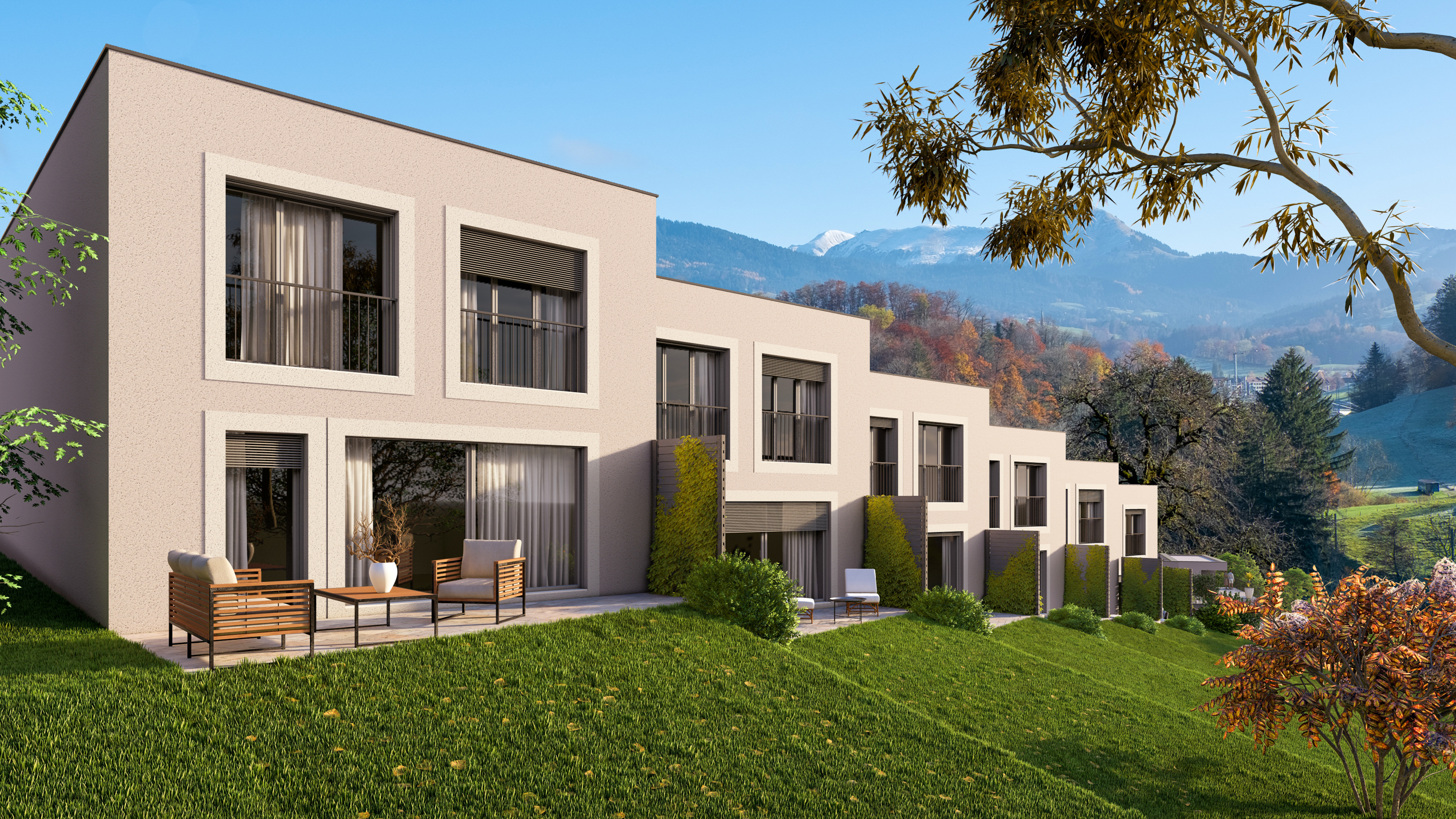 Projet immobilier à Remaufens avec appartements et villas à vendre : les façades sud des villas contiguës.